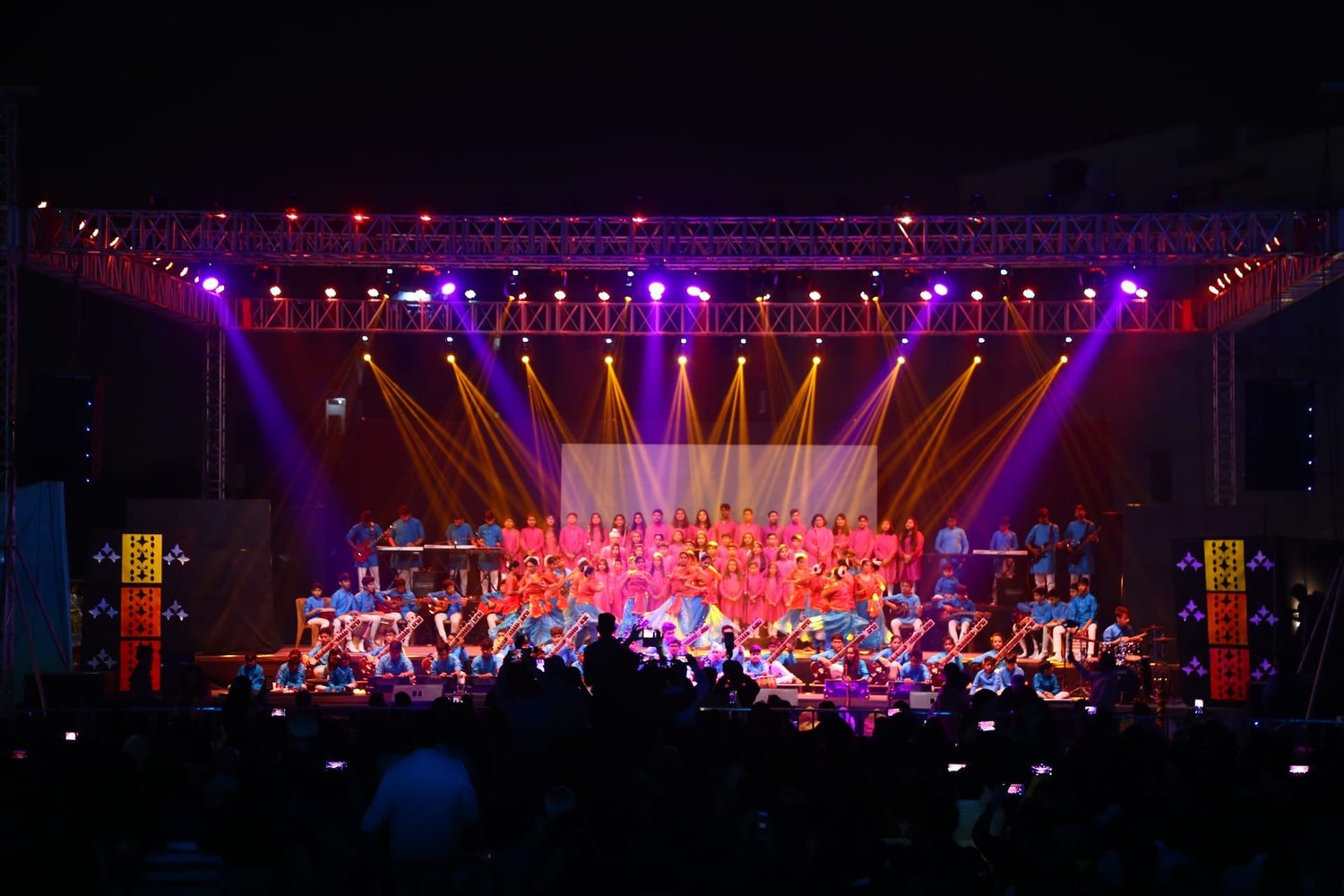 Students performing on stage during an annual day function